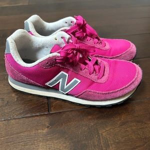 Hot pink New Balance shoes